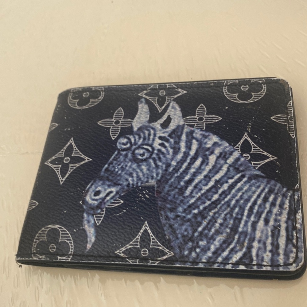 RARE LV WALLET BY CHAPMANN BROTHERS.